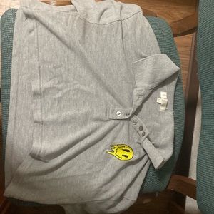 Gray short sleeve crop top with a smiley face